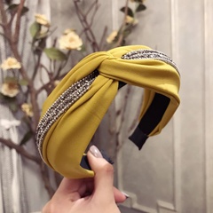 Koreanischer neuer Stil Großhandel einfache Kopf bedeckung Stirnband Koreanische Version des einfarbigen Haar höhlen Stoffs Kreuz haken Diamant breit krempiges Stirnband