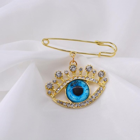 Brooch female pearl anti-light buckle blue eye brooch's discount tags