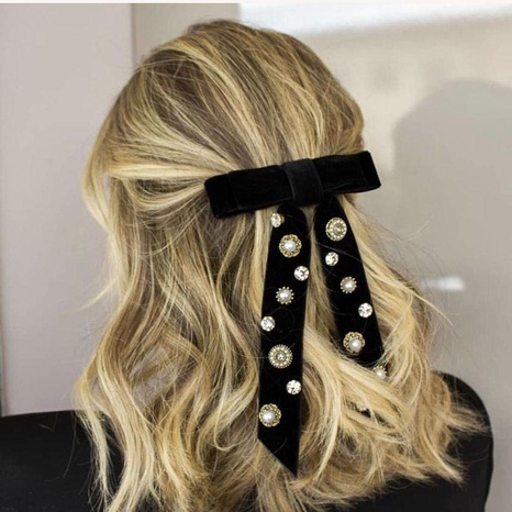 Fashion temperament bow tassel pearl artificial gemstone hair accessories NHWJ156845's discount tags