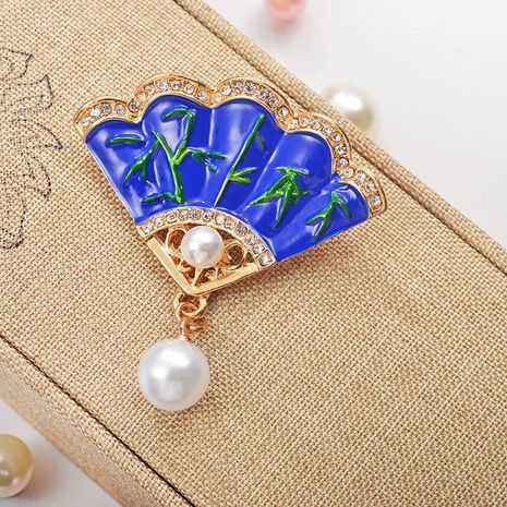 New accessories retro fan brooch corsage coat pin color glaze clothing wholesale NHDP190644's discount tags