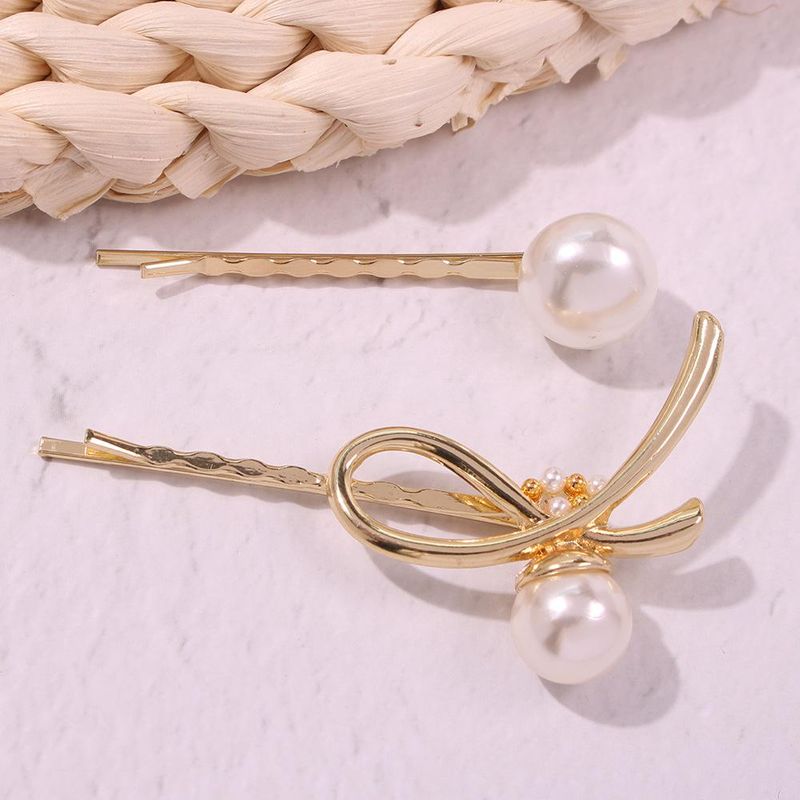 Beads geometric irregular bow hair clip NHMD129301