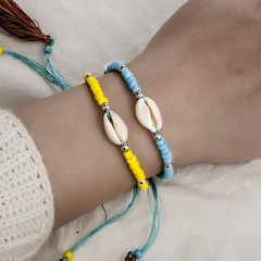Fashion woven string rice beads shell color tassel bracelet NHGY134340