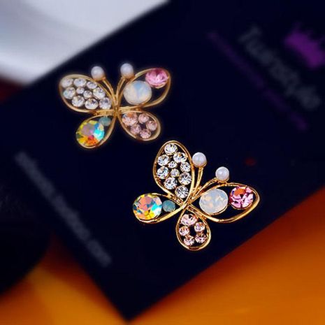Pearl butterfly cutout diamond earrings women's bow stud earrings's discount tags