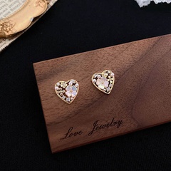 S925 silver needle Korean fashion hollow heart-shaped pearl high-end earrings