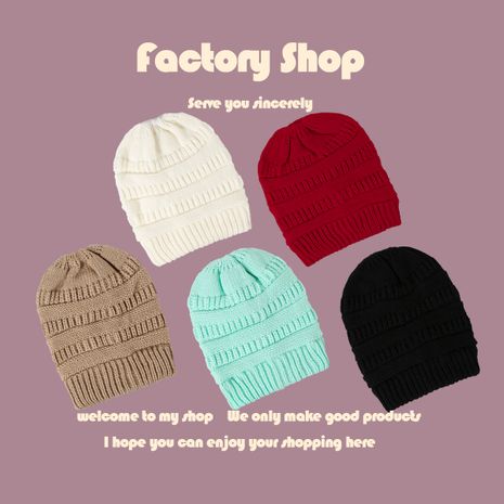 Pure color woolen fashion knitted hat's discount tags