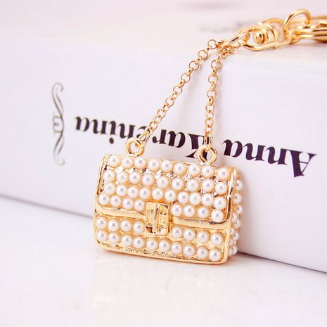 Korean  creative cute ladies pearl handbag key chain's discount tags