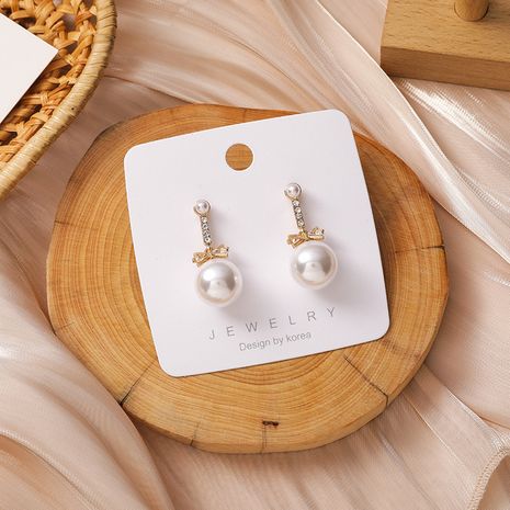 Korean   pearl bow earrings's discount tags