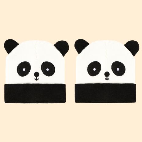 Korean cute panda knitted treasure warm sunshade children's ear protection fashionable woolen hat's discount tags