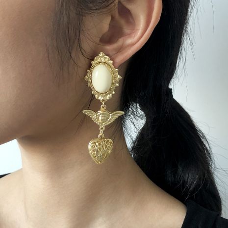 Baroque retro portrait hollow alloy resin earrings's discount tags