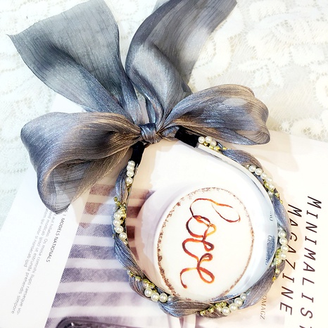 Diadema de perlas con trenza trenzada con lazo floral grande coreano's discount tags
