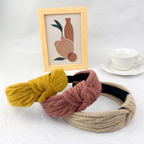 Korea's  new woolen yarn woven knotted headband's discount tags