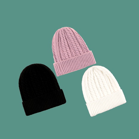 Pink twist knitted hat's discount tags