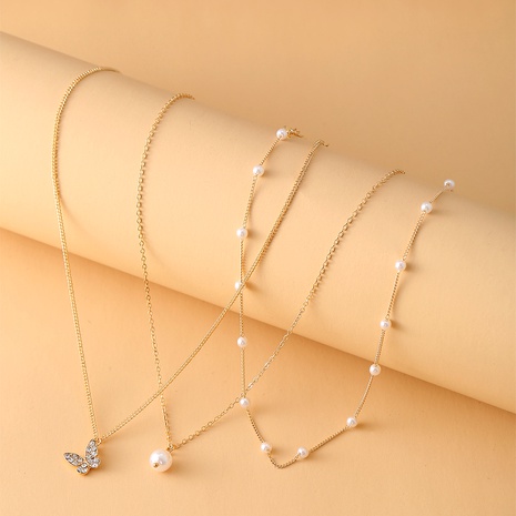 Artificial Pearl Simple Butterfly Pendant Multilayer Necklace's discount tags