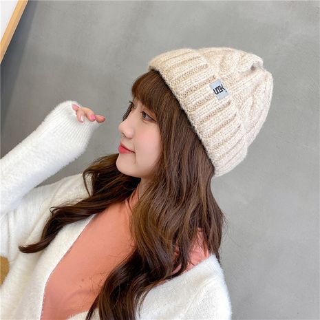 Korean woolen cotton all-match warm knitted hat's discount tags