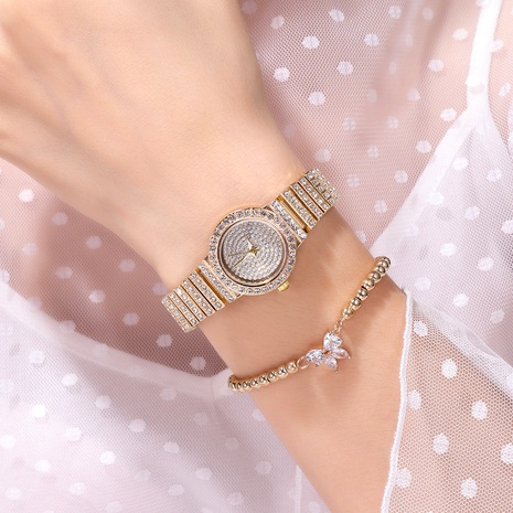 Reloj con banda de acero de cuarzo y diamantes de imitación's discount tags