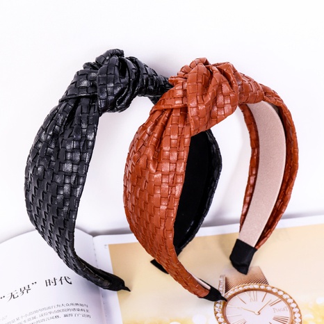 PU leather knotted headband's discount tags