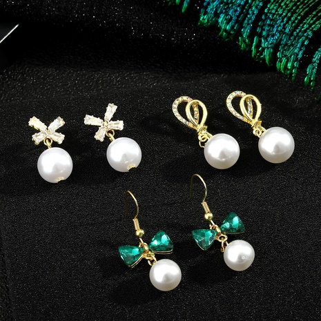 925 silver needle bow pearl earrings's discount tags