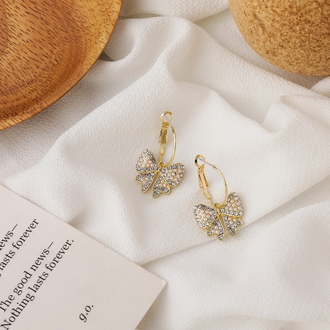full diamond pearl bow earrings's discount tags