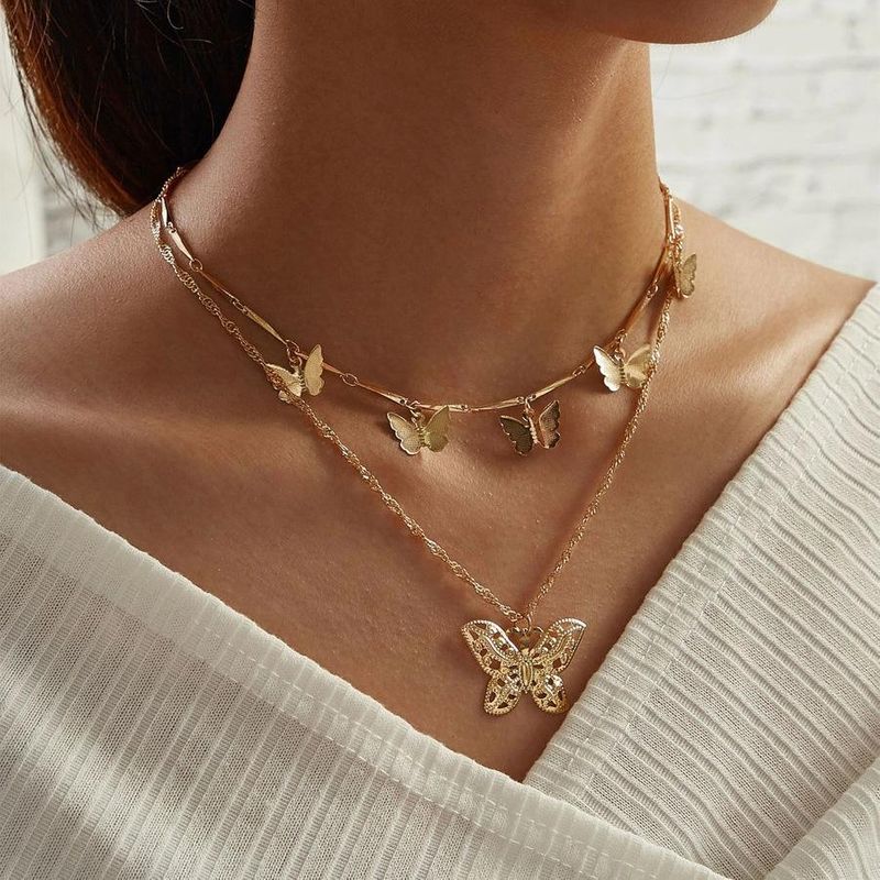 50700 Han Zhi shang Europische und amerikanische neue Schmetterlings anhnger mehr schicht ige Halskette kreative Retro Gold legierung Doppels chicht Halskette