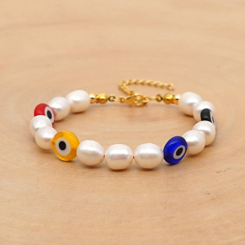 New simple baroque pearl glazed evil eye ethnic style bracelet for women wholesale NHGW210634