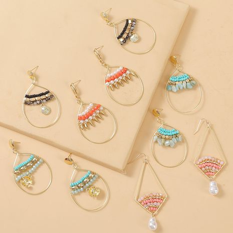 Bohème shell boucles d'oreilles perles de riz tissées à la main créative boucles d'oreilles rondes bijoux nihaojewelry gros's discount tags