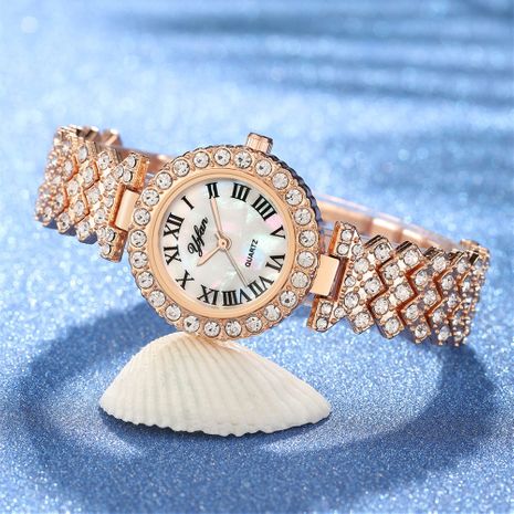 Temperamento rhinestone cadena de metal reloj de correa de acero de cuarzo para mujer moda diamante diamante estrellado escala romana reloj femenino's discount tags