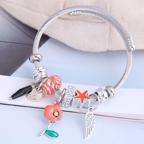 fashion metal wild pan DL simple small flower wings pendant multi-element accessories personalized bracelet wholesale nihaojewelry's discount tags