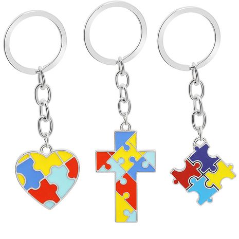 puzzle pour enfants créatifs sauvage quatre couleurs puzzle goutte huile épissage couleur en forme de coeur croix porte-clés pendentif en gros nihaojewelry's discount tags
