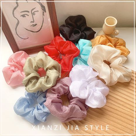 Glossy girl hair scrunchies simple  solid color bow hair circle super fairy seamless hair rope wholesale nihaojewelry NHOF219460's discount tags