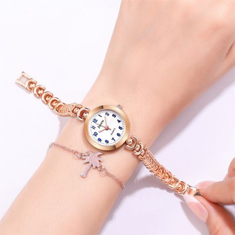 Reloj de pulsera de moda coreana para mujer, estilo universitario, reloj de correa de acero con esfera pequeña, reloj de aguja azul simple, reloj de nihaojewelry al por mayor's discount tags