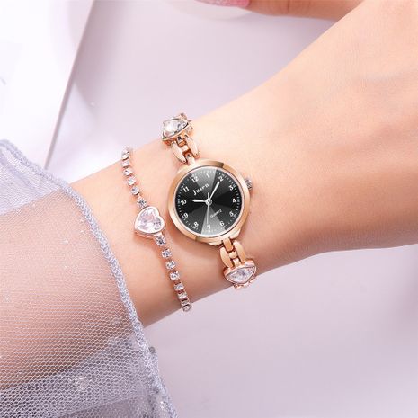 Nueva tendencia señoras reloj coreano niñas Rhinestone pulsera reloj moda acero banda venta al por mayor nihaojewelry's discount tags