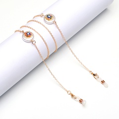 Lunettes antidérapantes en métal populaire corde yeux dorés perle strass pendentif lunettes chaîne mode en gros nihaojewelry