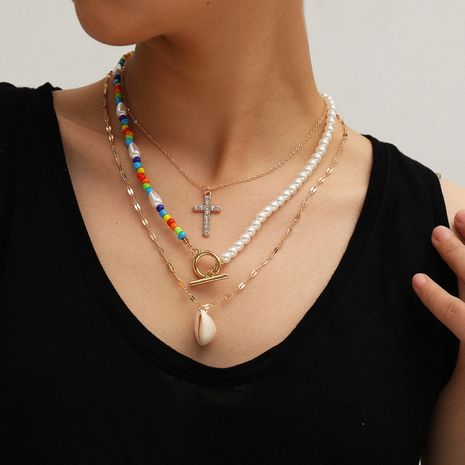 fashion jewelry wild ocean wind shell necklace fashion asymmetric handmade beaded cross necklace wholesale nihaojewelry NHXR225447's discount tags