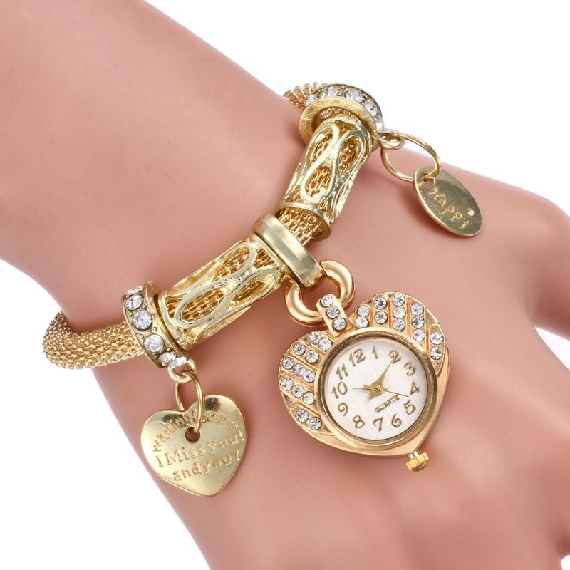 Explosion ladies bracelet watch fashion diamond gold heart quartz alloy bracelet watch hot watch wholesale nihaojewelry