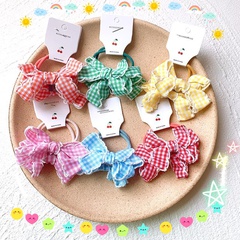 Nouveaux accessoires de cheveux d'arc pour enfants en treillis princesse bande de caoutchouc filles tête corde coiffe bande de caoutchouc accessoires de cheveux coréens