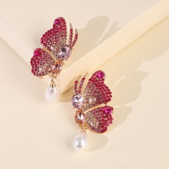 Nuevos grandes pendientes de perlas de alas de mariposa de diamantes de imitación exagerados pendientes de grandes damas al por mayor nihaojewelry