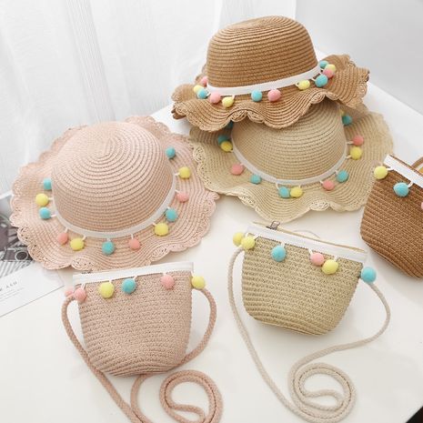Children's hats girls summer shade sunscreen seaside sun hats sweet cute crossbody bag colored ball lotus leaf straw hat wholesale nihaojewelry's discount tags