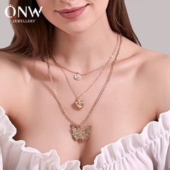 joyería de moda amor exagerado collar de mariposa hueco moda larga multicapa damas suéter cadena venta al por mayor nihaojewelry