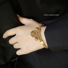 Koreanischer Titans tahl vergoldetem Gold Bafang Laicai Doppels chicht stahlkugel love runder elastischer Draht hand gewebtes Armband E118