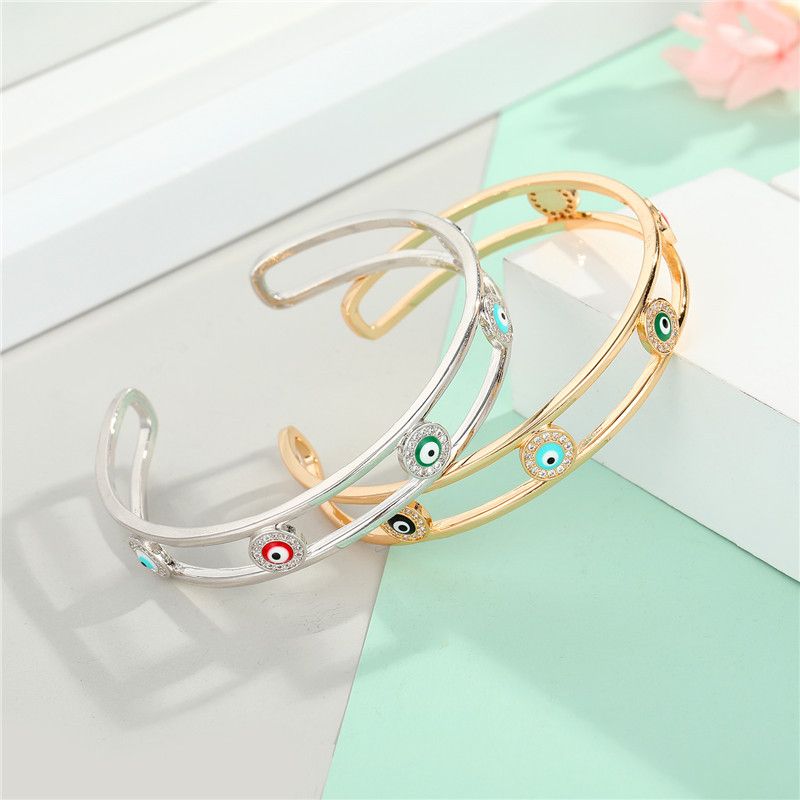 Color zircon eye bracelet new gold plated diamond drop oil bangle bracelet wholesale nihaojewelry NHGO235279