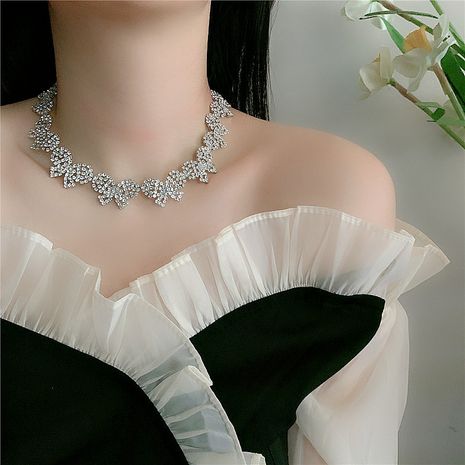 ladies stereo three-dimensional bow choker clavicle necklace full diamond bright earrings wholesale nihaojewelry NHYQ230846's discount tags