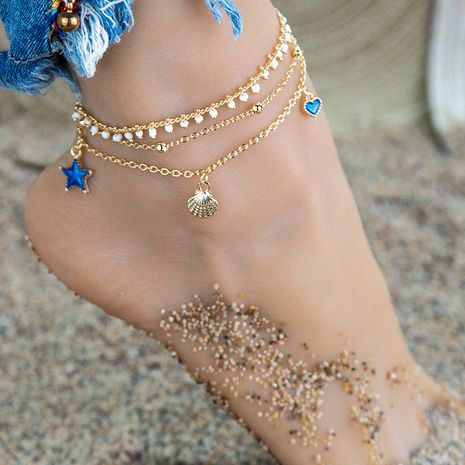 Océan série ornements de pied de pétoncle en métal simple perle de riz amour cheville en gros nihaojewelry's discount tags