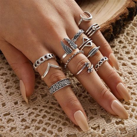 New retro V-shaped totem wings triangle moon love leaf 12-piece ring set wholesale  NHGY244512's discount tags