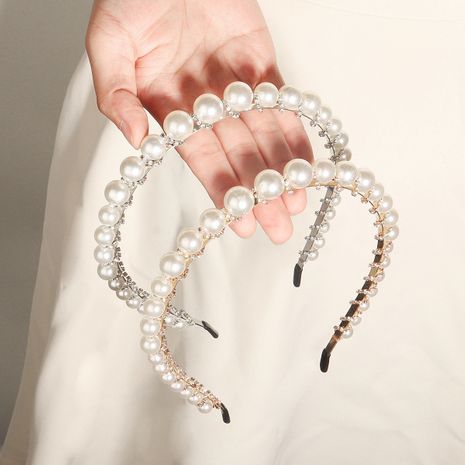 Korean women's pearl wild ladies retro press headband  NHHS244624's discount tags