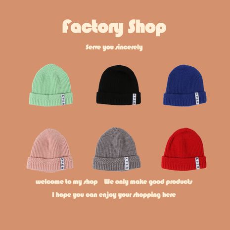 Fabric core-spun yarn knitted hat solid color simple children's woolen hat wholesale nihaojewelry's discount tags