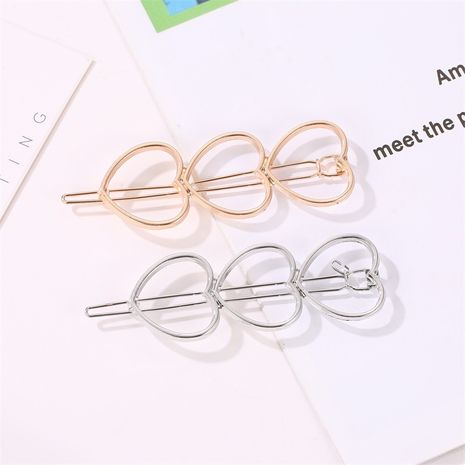 Korean fashion metal hairpin simple hollow three peach heart bangs hairpin Wholesale nihaojewelry's discount tags