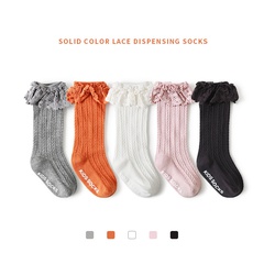 Chaussettes pour enfants pour l'automne et l'hiver nouvelles chaussettes de tube moyen en dentelle de couleur unie automne coton bébé en gros