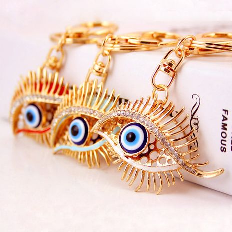 Porte-clés pendentif en métal pendentif en cristal de l'oeil du diable coréen serti de diamants's discount tags