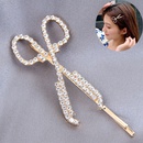 Korean fashion and sweet girl wearing diamondstudded scissors side hair clippicture6