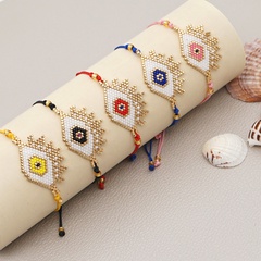 Reisperle gewebtes Teufelsauge Retro exotische Perlen Armband für Frauen